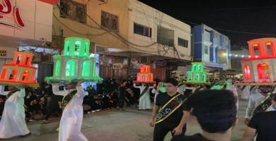 بالصور: المواكب الحسينية في الناصرية تحيي ذكرى ليلة الثامن المحرم