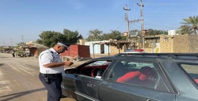 بالصور: تنفيذ ممارسة مرورية لمحاسبة المخالفين في اقضية ونواحي ذي قار 