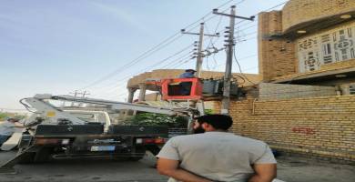 كهرباء ذي قار تنفذ حملة لرفع التجاوزت بمناطق خلف السريع