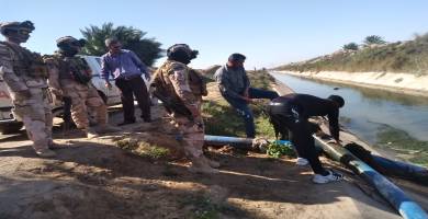 بالصور: الموارد المائية تغلق المنافذ المتجاوزة على نهر الغراف شمال الناصرية
