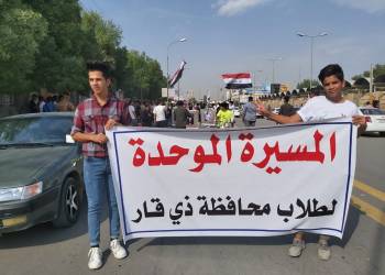 بالصور: طلبة مدارس ذي قار يستذكرون مسيرتهم السنوية الثانية في تظاهرات تشرين