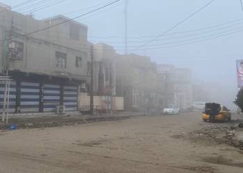 بالصور: الضباب يحجب الرؤية في الناصرية