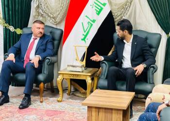 المحافظ والوزير